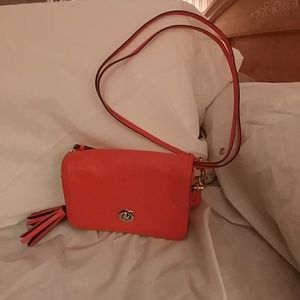 Coach purse cross body or clutch.